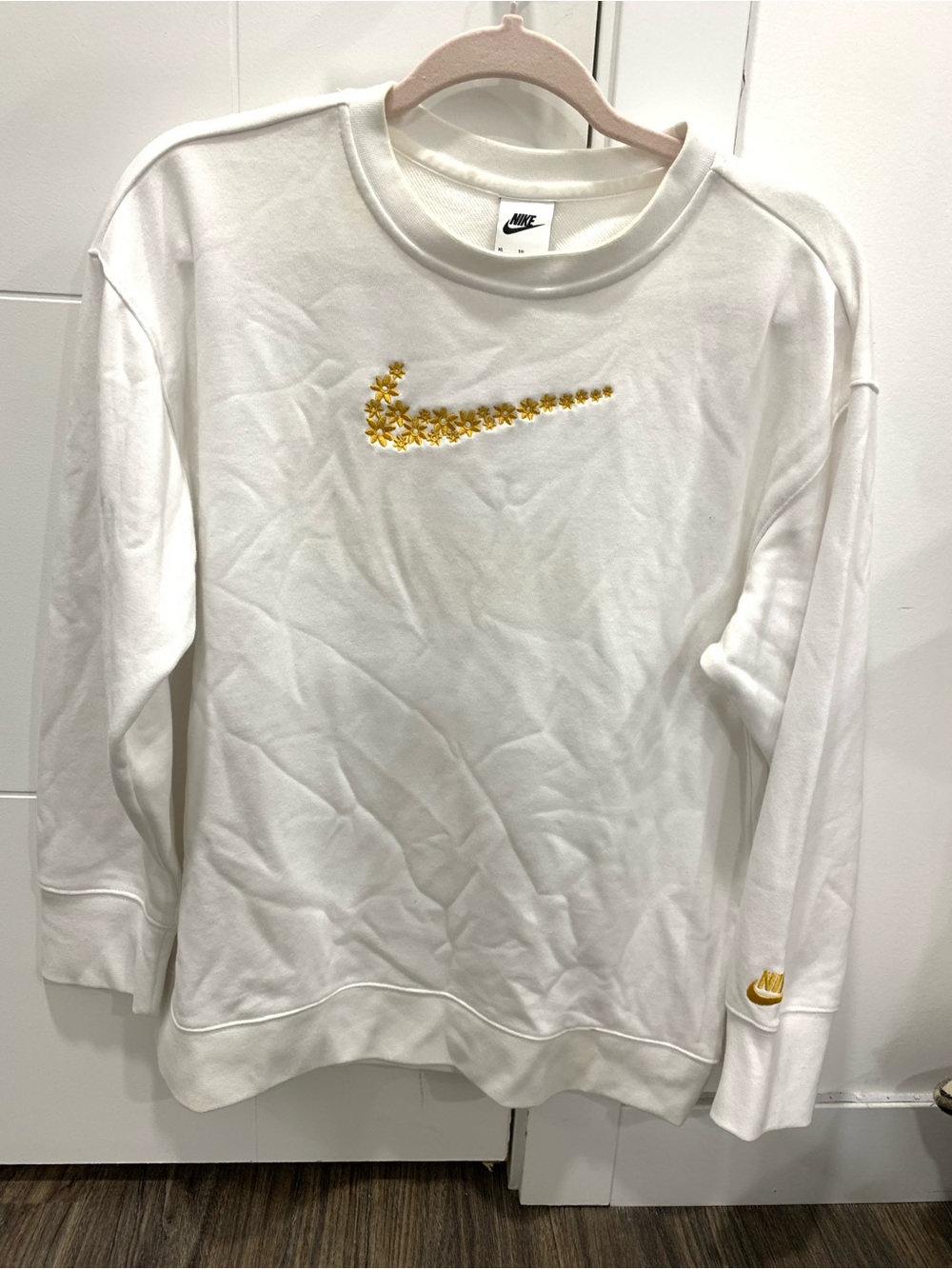 Nike White Crewneck Sweatshirt with Gold Floral Swoosh